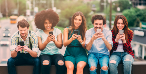 Millennials on their devices_Pace Blog_2018